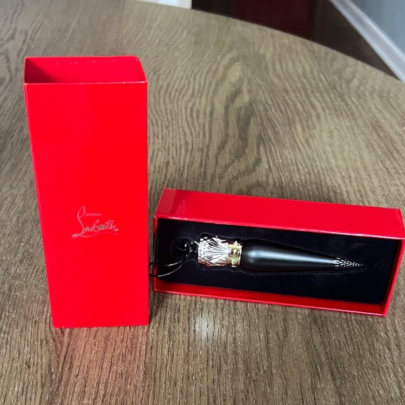 Christian Louboutin Black Lipstick with Red and Gold Accents